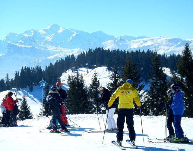 Spring skiing in Les Gets, with Mont Blanc in the background.